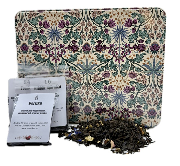 Julkalender med 24 svarta teer i William Morris burk